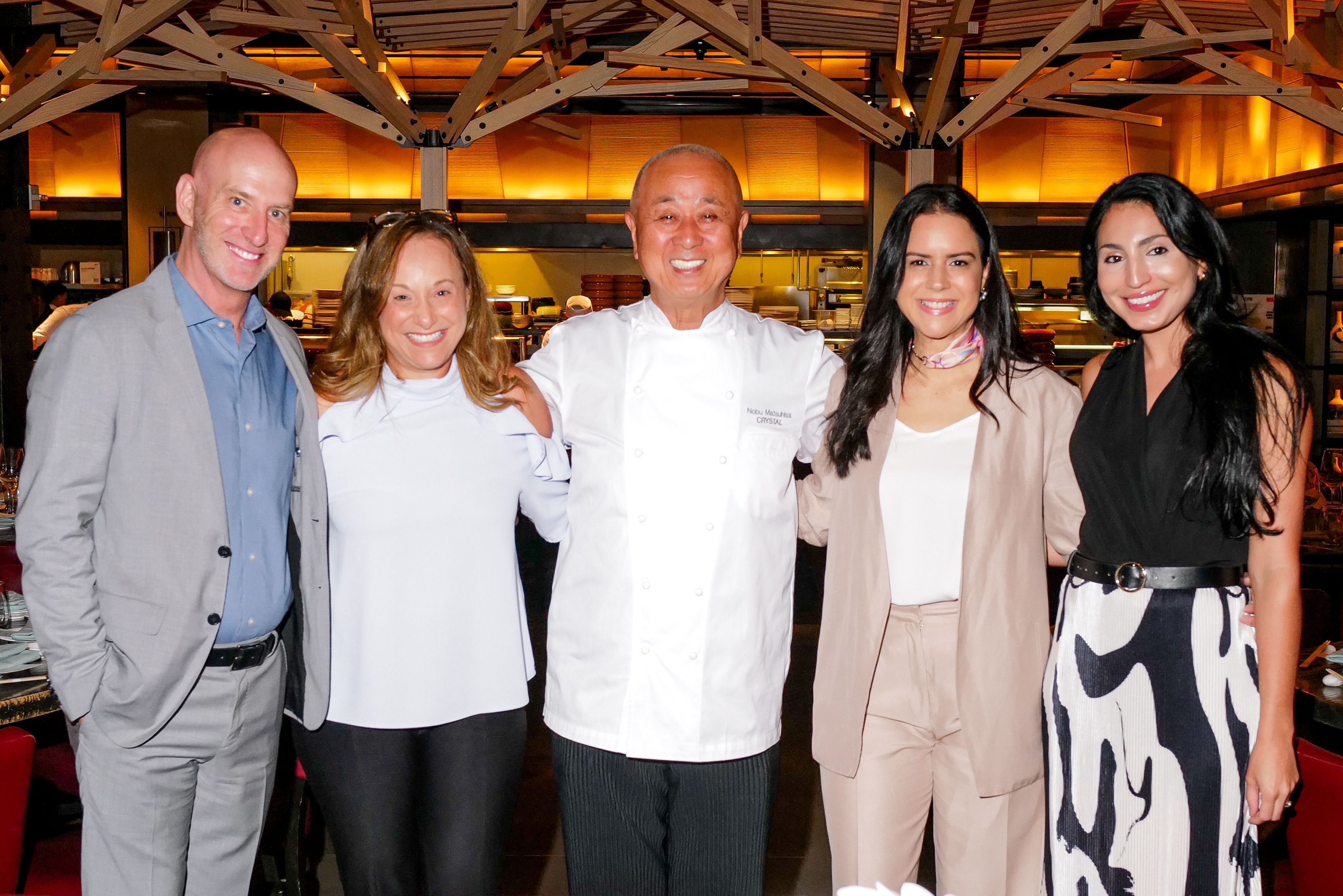 Friends reunited: Members of the Crystal team with Chef Nobu, a partnership of more than 20 years